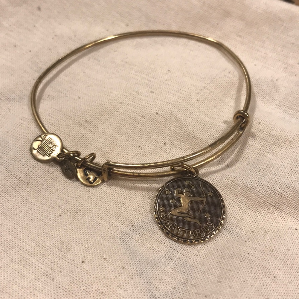 Gold Alex and Ani Sagittarius bracelet.